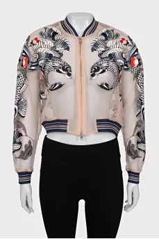 Transparent bomber jacket decorated with embroidery