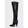 Leather over-the-knee boots with a slanted heel