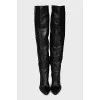 Leather over-the-knee boots with a slanted heel