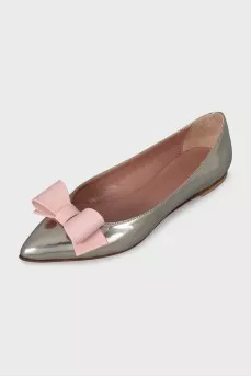 Silver ballet flats with a bow