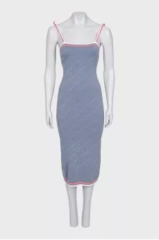 A fitted grey dress in a signature print