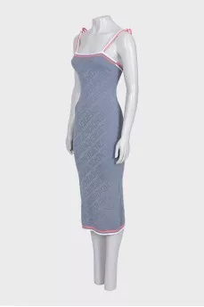 A fitted grey dress in a signature print