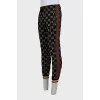 Men's sweatpants with a signature print