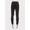 Men's sweatpants with a signature print