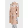 Dress with a buttoned patch pocket