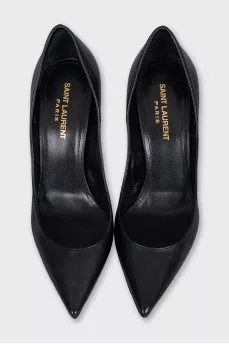 Black leather pumps