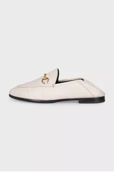 White leather loafers