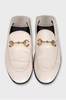 White leather loafers