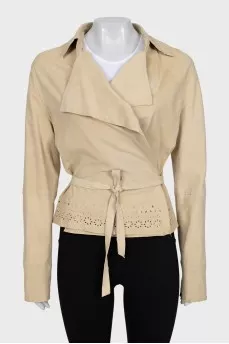 Wrap shirt decorated with perforations