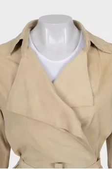 Wrap shirt decorated with perforations