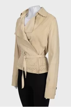 Wrap shirt decorated with perforations