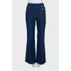 Blue straight jeans decorated with buttons
