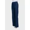 Blue straight jeans decorated with buttons