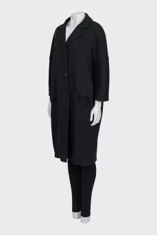 Double-breasted coat with bows