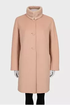 Pink coat with a fur collar