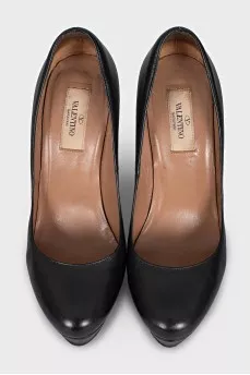 Black leather high heel shoes