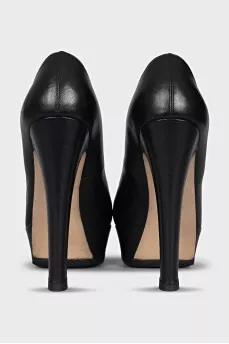 Black leather high heel shoes
