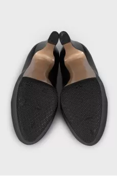 Black leather high heel shoes