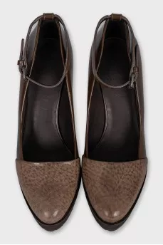 Brown shoes with a strap