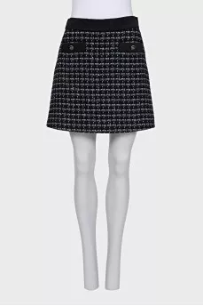 Tweed black suit with a skirt