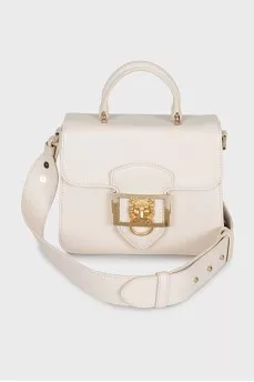 Leather bag with gold decor