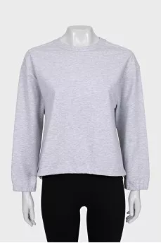 Gray sweatshirt decorated with beads