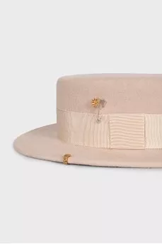 Beige hat with metallic decor