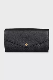 Black leather wallet with branded embossing