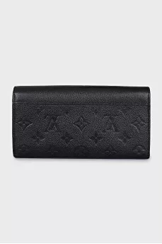 Black leather wallet with branded embossing