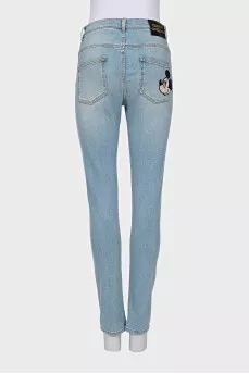 Skinny jeans with a patch on the pocket