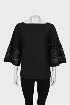 Black blouse with perforated sleeves