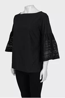 Black blouse with perforated sleeves