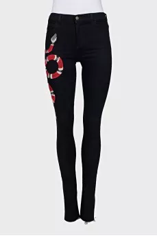 Skinny jeans with snake embroidery