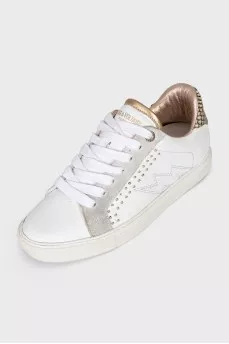 White sneakers with animal print inserts