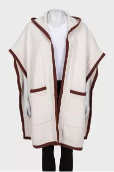 White cape with brand logo