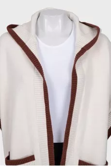 White cape with brand logo