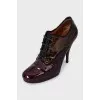 Patent leather lace-up ankle boots