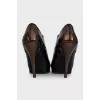 Patent leather lace-up ankle boots