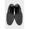Patent leather lace-up ankle boots
