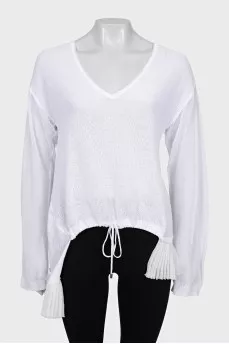 Loose-fitting blouse with frills