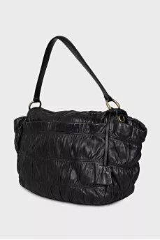 Soft leather bag with handle and strap