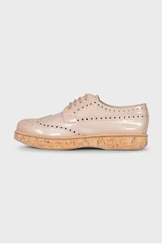 Beige perforated shoes