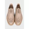 Beige perforated shoes