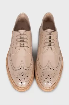 Beige perforated shoes
