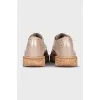 Beige perforated shoes