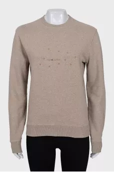 Beige jumper with a print