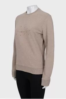 Beige jumper with a print