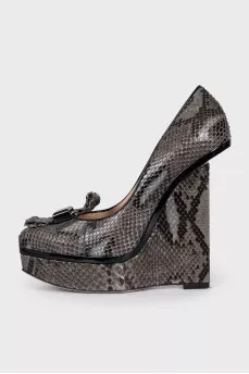 Snakeskin wedge shoes