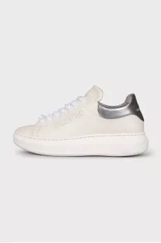 White leather sneakers with brand logo