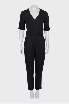 Black jumpsuit with a patch